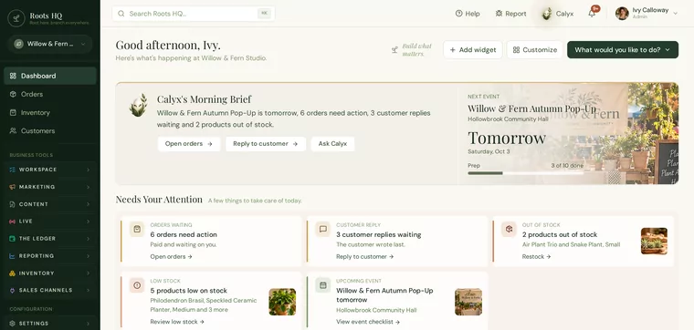 Ivy Calloway's Roots HQ dashboard for Willow & Fern: “Good afternoon, Ivy”, Calyx's Morning Brief, the Autumn Pop-Up as the next event tomorrow with its cover photo and prep progress, and a Needs Your Attention list of orders, customer replies and stock.